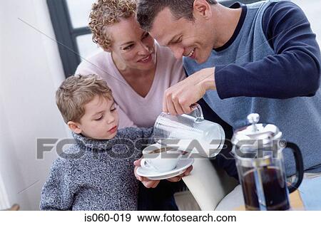 Stock Photo - Family at breakfast. Fotosearch