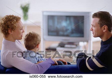 Paruošta fotografija - Family watching TV. Fotosearch