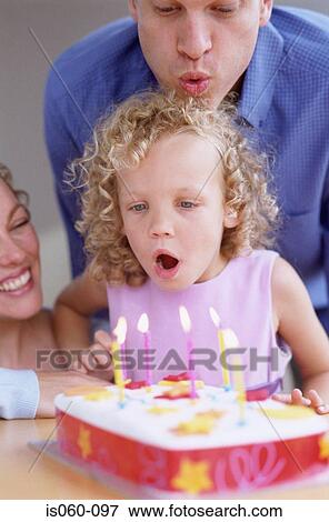 Family with birthday cake View Large Photo Image Stock Photo - Family with birthday cake. Fotosearch