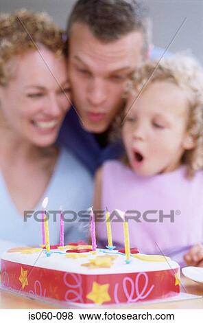 Family with birthday cake View Large Photo Image Stock Photo - Family with birthday cake. Fotosearch
