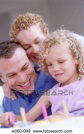 Family with birthday cake View Large Photo Image Stock Photo - Family with birthday cake. Fotosearch