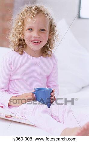 Girl drinking tea View Large Photo Image Stock Photo - Girl drinking tea. Fotosearch