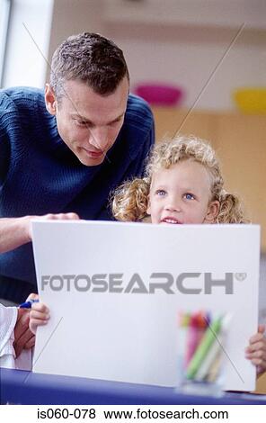 Girl with picture View Large Photo Image Stock Photo - Girl with picture. Fotosearch