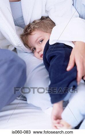 Mother hugging boy View Large Photo Image Stock Image - Mother hugging boy. Fotosearch