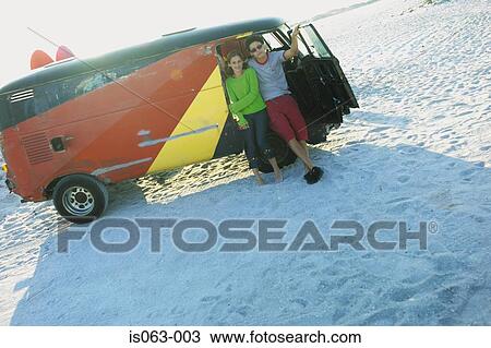 Couple on beach View Large Photo Image Stock Image - Couple on beach. Fotosearch
