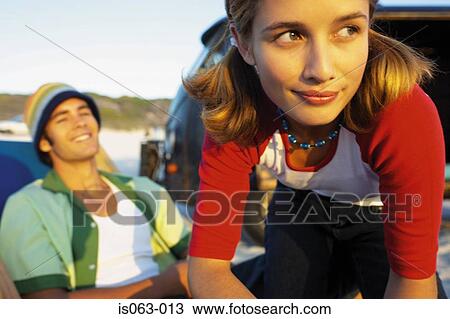 Stock Image - Couple on beach. Fotosearch