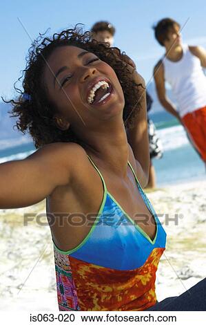 Stock Image - Girl laughing. Fotosearch