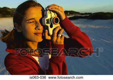 Girl taking picture View Large Photo Image Stock Photograph - Girl taking picture. Fotosearch