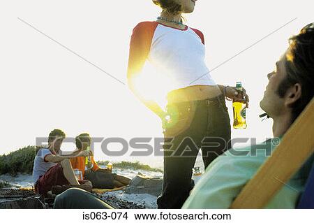 Picture - People on beach. Fotosearch