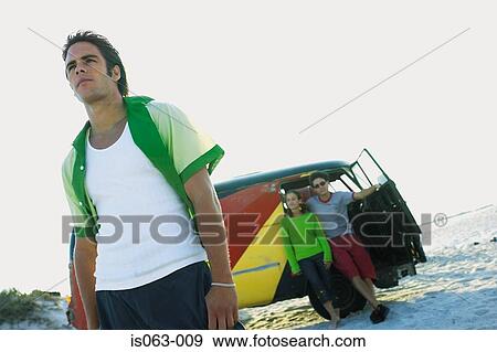 Stock Photo - People on beach. Fotosearch