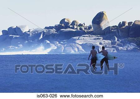 Surfers on beach View Large Photo Image Stock Photograph - Surfers on beach. Fotosearch