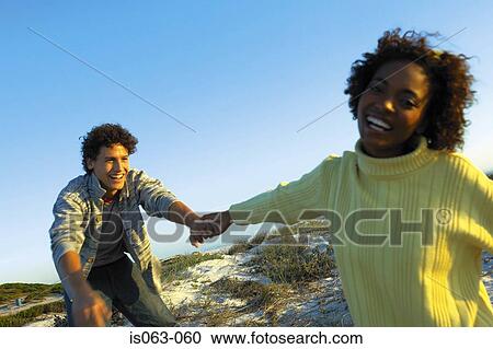 Young couple View Large Photo Image Stock Image - Young couple. Fotosearch