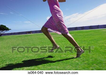 Stock Image - Girl running. Fotosearch