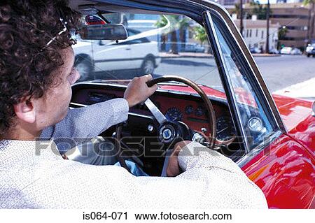 Stock Image - Man in car. Fotosearch