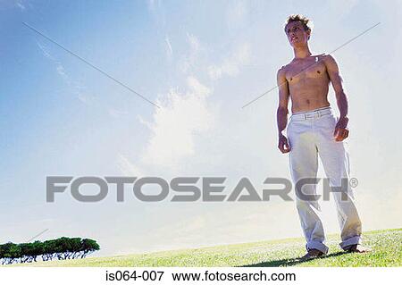 Stock Photo - Man outdoors. Fotosearch