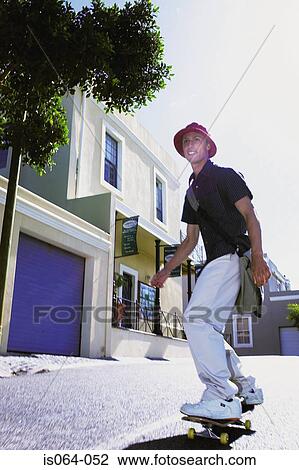 Man skateboarding View Large Photo Image Stock Image - Man skateboarding. Fotosearch