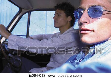 Men driving in car View Large Photo Image Stock Image - Men driving in car. Fotosearch