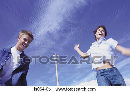 Men leaping View Large Photo Image Stock Image - Men leaping. Fotosearch