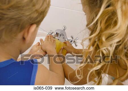 Children washing hands View Large Photo Image Stock Photo - Children washing hands. Fotosearch