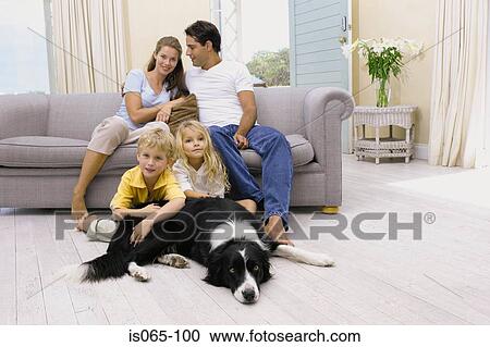 Stock Image - Family at home. Fotosearch