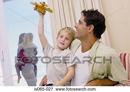 Stock Photo - Family at home. Fotosearch