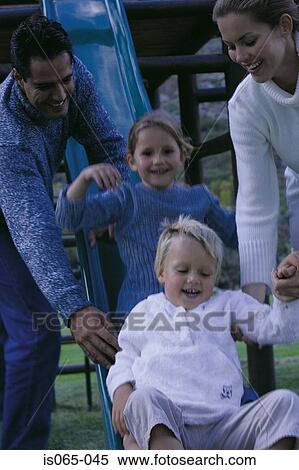 Family on playground View Large Photo Image Stock Photography - Family on playground. Fotosearch