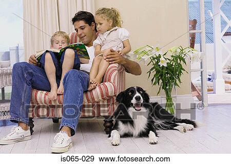 Father reading story View Large Photo Image Stock Photo - Father reading story. Fotosearch