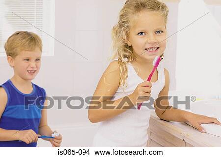 Kids brushing teeth View Large Photo Image Picture - Kids brushing teeth. Fotosearch