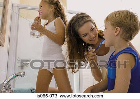 Kids brushing teeth View Large Photo Image Stock Image - Kids brushing teeth. Fotosearch