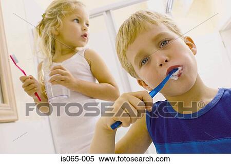 Stock Photography - Kids brushing teeth. Fotosearch