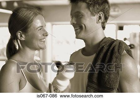 Couple in gym View Large Photo Image Stock Photograph - Couple in gym. Fotosearch