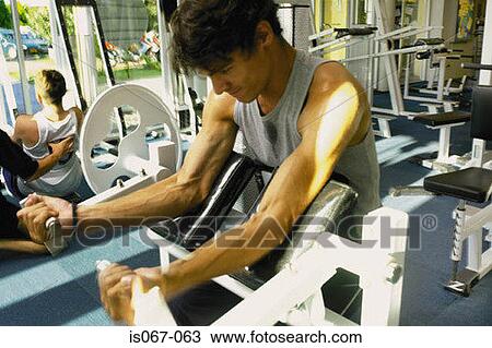 Men weight-training View Large Photo Image Stock Image - Men weight-training. Fotosearch