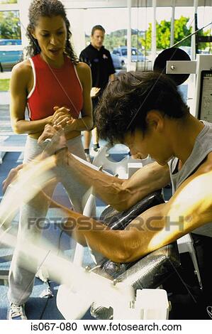 People weight-training View Large Photo Image Stock Image - People weight-training. Fotosearch