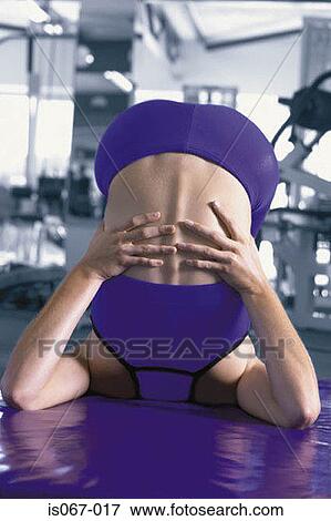 Woman exercising View Large Photo Image Stock Photo - Woman exercising. Fotosearch