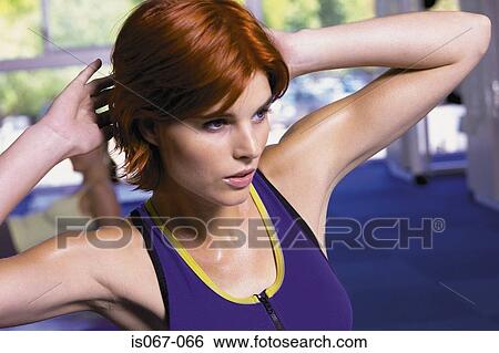Woman exercising View Large Photo Image Stock Photograph - Woman exercising. Fotosearch