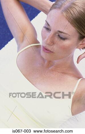 Woman working out View Large Photo Image Stock Image - Woman working out. Fotosearch