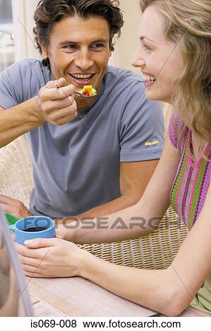 Couple at breakfast View Large Photo Image Stock Photo - Couple at breakfast. Fotosearch