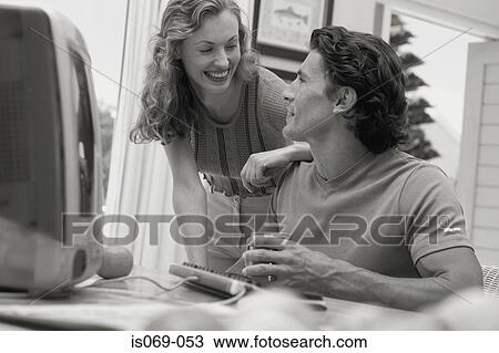 Couple at computer View Large Photo Image Stock Image - Couple at computer. Fotosearch