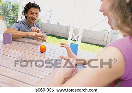 Couple at table View Large Photo Image Stock Photography - Couple at table. Fotosearch