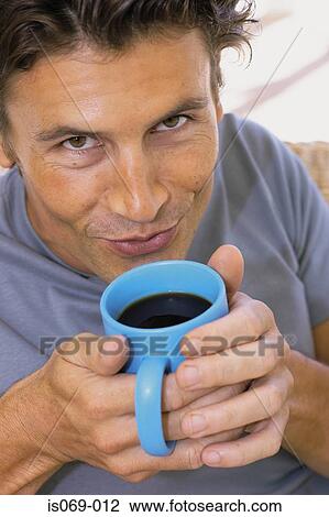 Man drinking coffee View Large Photo Image Stock Image - Man drinking coffee. Fotosearch