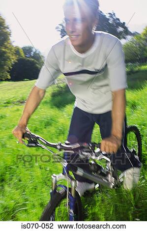 Stock Image - Man cycling. Fotosearch