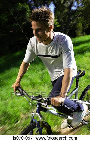 Stock Photo - Man cycling. Fotosearch