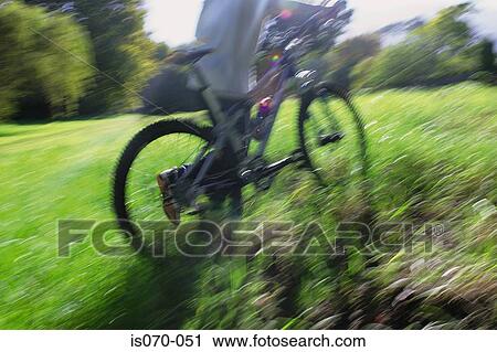 Man pushing bike View Large Photo Image Stock Image - Man pushing bike. Fotosearch