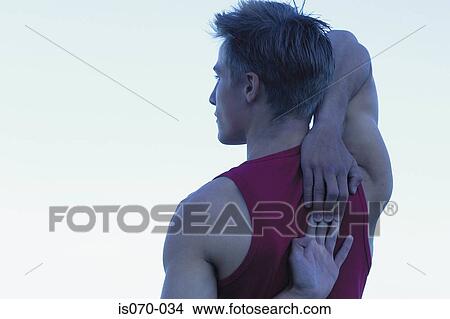 Man stretching View Large Photo Image Picture - Man stretching. Fotosearch