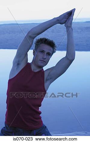 Man stretching View Large Photo Image Stock Image - Man stretching. Fotosearch