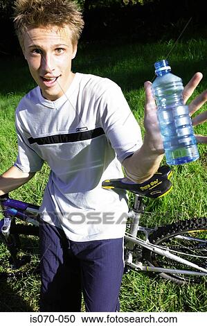 Man with mountain bike View Large Photo Image Stock Image - Man with mountain bike. Fotosearch