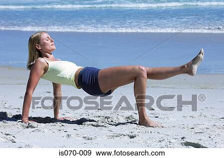 Woman exercising View Large Photo Image Stock Photo - Woman exercising. Fotosearch