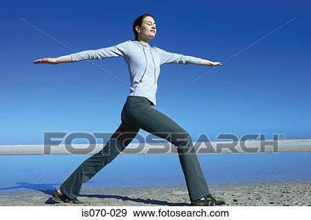 Woman exercising View Large Photo Image Stock Photo - Woman exercising. Fotosearch