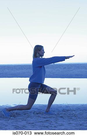 Woman stretching View Large Photo Image Stock Image - Woman stretching. Fotosearch