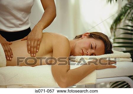 Back massage View Large Photo Image Stock Photo - Back massage. Fotosearch